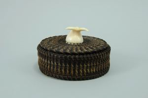 Image of baleen basket with whale fluke finial